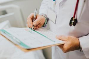a doctor writing something
