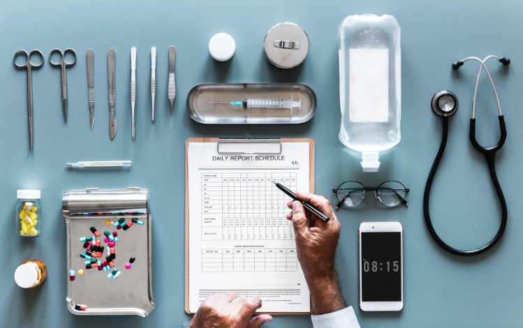 a person noting medical record